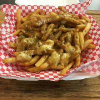 Poutine · Crisp French fries or house made potato wedges topped with cheese curds then drizzled with h...