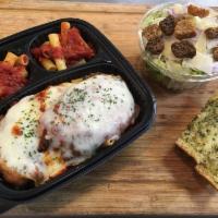 Chicken Parmesan · Generous potion of hand-breaded chicken breast topped with our homemade marinara and blend o...