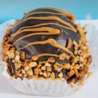Personal Peanut Butter Explosion · A chocolate candy bar bottom, topped with a peanut butter ganache and a mound of chocolate m...