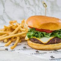 Classic Burger · Brioche bun, 6 oz. patty, lettuce, tomato, pickles, onion and American cheese.