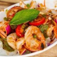 Spicy Shrimp Salad · Prawns mixed with chili paste, lime, mint, and cilantro.