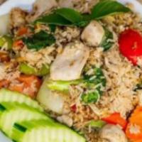 Thai Basil Fried Rice · Rice, chicken, egg, green and red onion, carrot, bell pepper, broccoli, mushroom, Thai basil...