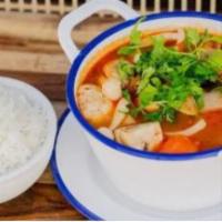 Tom Yum · A famous Thai hot and sour soup, mushroom aromantic, Thai herbs, roasted chili paste, and ci...
