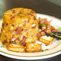 Salami & Cheese Mofongo · Mashed green plantains mixed with fried Salami & Cheese  , served with gravy on the side.