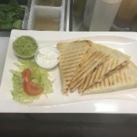 Quesadillas · Served with Spanish salsa and sour cream.