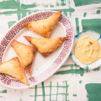 Crab Rangoon with Cream Cheese- Tam Giác Chiên · Filled with Crab Meat and Cream Cheese