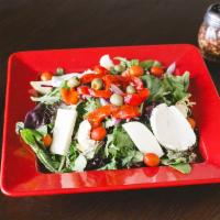 Tossed Salad · Lettuce, tomatoes, olives, onions, artichokes, roasted red peppers and house-made fresh mozz...