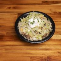 Philly Rice Bowl · Fresh Steamed Rice, Steak or Chicken, Black Beans, Romaine, Shredded Cheese, Grilled Onions,...