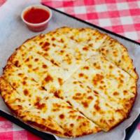 Cheesy Garlic Bread · Fresh bread topped with our garlic butter sauce and mozzarella cheese, baked and served with...