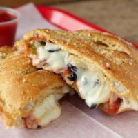 The Works Calzone Wrap · Papa Ray's pizza sauce, Italian sausage, pepperoni, onions, black olives, fresh mushrooms an...