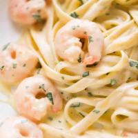 Prawns Fettuccine · Fresh prawns, garlic, herbs and tomatoes with choice of sauce.
