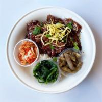 LA Galbi Rice Bowl · sweet-soy glazed beef short ribs served with white rice. served with a side of kimchi and st...