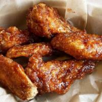  Spicy K-BBQ Baked Wings · crispy korean chicken wings air-fried to perfection, tossed in our spicy K-BBQ sauce. select...