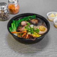 Chashu Ramen · Pork belly in 12 hours cooking tonkotsu broth, ramen egg, nori, corn, mixed green vegetables...