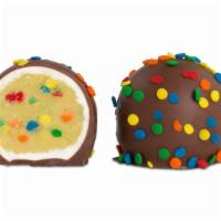Birthday Cake Truffle · Each. White chocolate birthday cake flavored center with colorful sprinkles in a milk chocol...
