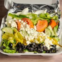 GREEK SALAD · Tomatoes, red onions, feta cheese, black olives, green peppers, pepperoni and cucumbers
