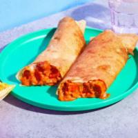 Paneer Masala Dosa · Paneer cooked with a rich tomato cream sauce rolled in a fluffy dosa.