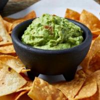 Chips & Guacamole · Made fresh, topped with pico de gallo. Served with corn tortilla chips.
