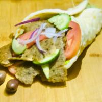 Lamb and Beef Gyro. · Cucumber, Tomato, Red Onion and Tzatziki Sauce Wrapped in Greek Pita.