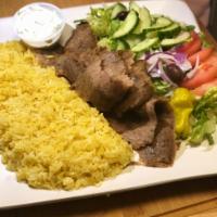 Lamb and Beef Plate. · Served over Rice with Side of Small Greek Salad, Hummus and Greek Pita .