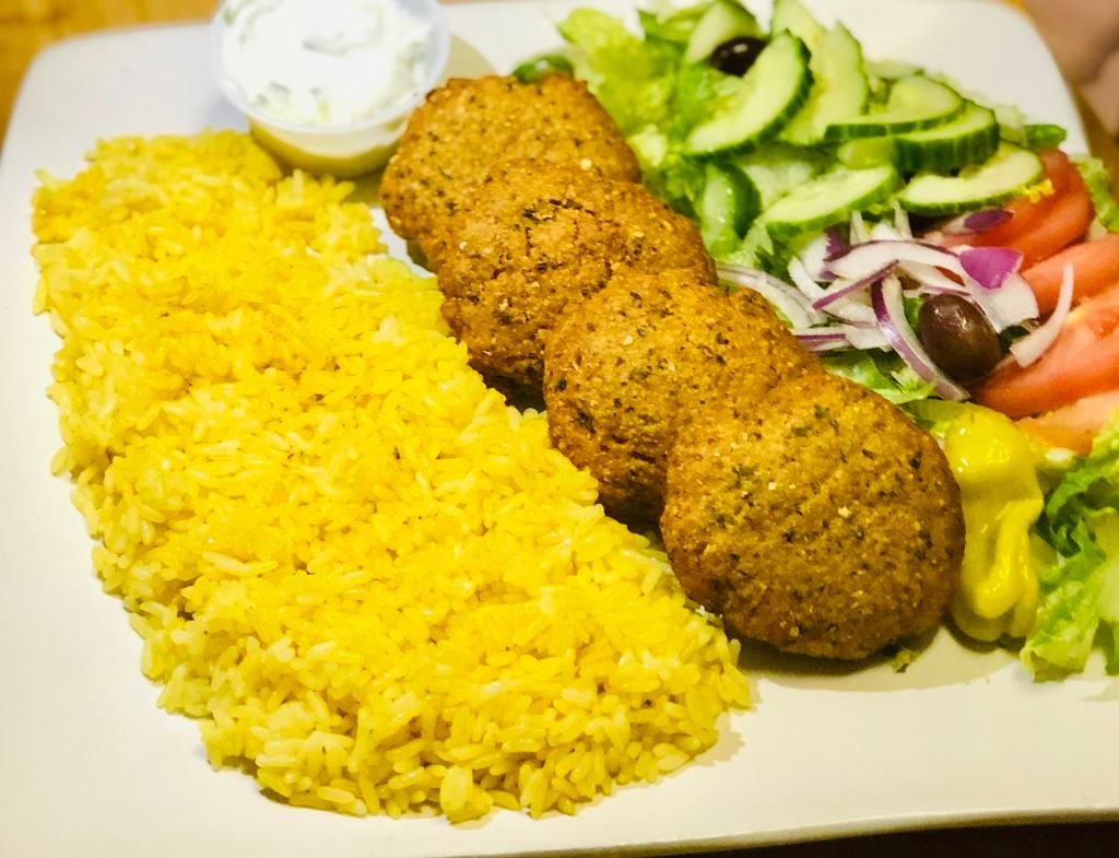 Falafel Vegan Plate. · Falafal Patties Served over Rice with side of small Greek salad, Hummus and Pita.