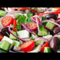 Greek Salad · Spring mix, feta cheese with mixed lettuce with tomatoes, cucumbers, onions, Kalamata olives...