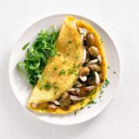 Mushroom Omelette · Fresh eggs, hearty mushrooms, onions, and mozzarella cheese.