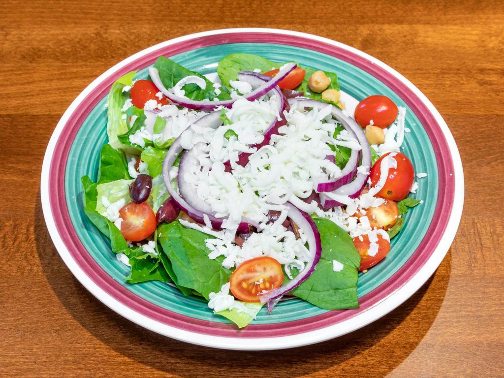 Mediterranean Salad · Romaine lettuce, spinach, baby tomatoes, garbanzo beans, Kalamata olives, mozzarella cheese, red onion, house made vinaigrette.