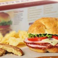 Ham Classic Sandwich Meal · Honey Baked Ham topped with Swiss cheese, lettuce, tomato, Duke’s® mayonnaise, and hickory h...