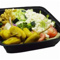 Greek Salad · Romaine and iceberg lettuce mix, onion, tomato, cucumber, feta cheese and green olives. Serv...