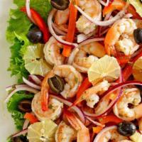 Shrimp Lemon-Pepper Shrimp Salad Bowl · Lemon pepper flavored shrimp, peppers, onions, on a bed of fresh green salad and drizzled wi...
