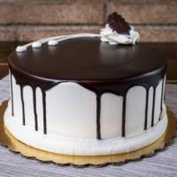 Shadow Cake · 2 layers of vanilla cake with one layer of chocolate cake, filled with chocolate buttercream...