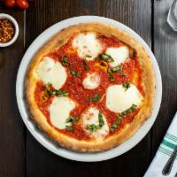 Margherita  Pizza · Flor di latte (fresh mozzarella), basil and San Marzano tomato sauce.