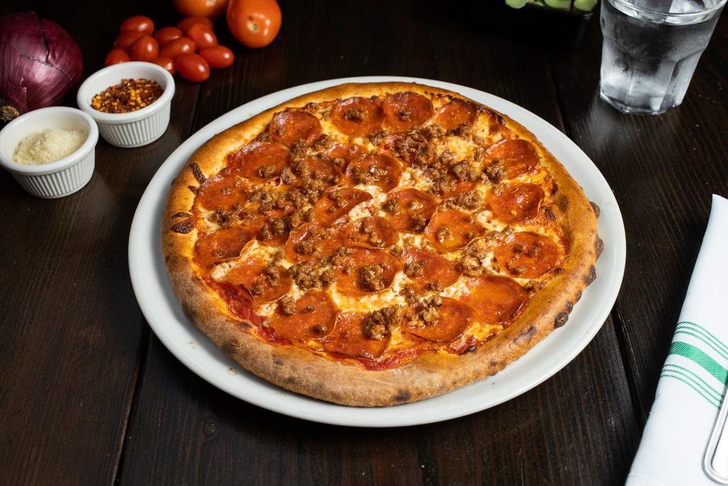 Meat Lover’s  Pizza · Italian sausage, pepperoni, bacon, mozzarella and San Marzano tomato sauce.
