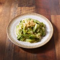 Caesar Salad · Romaine lettuce, shaved Parmesan cheese, garlic crouton and house Caesar dressing. Vegetarian.