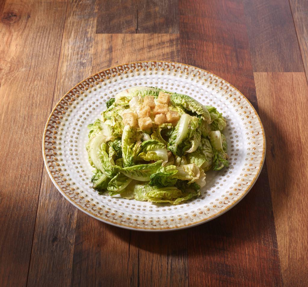 Caesar Salad · Romaine lettuce, shaved Parmesan cheese, garlic crouton and house Caesar dressing. Vegetarian.