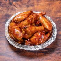 Honey BBQ Wings  · Cooked wing of a chicken coated in sauce or seasoning.