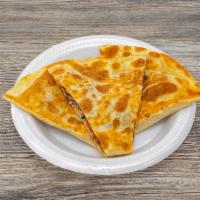 Chicken Quesadilla · Marinated chicken strips seasoned and grilled then placed in a flour tortilla with melted ch...