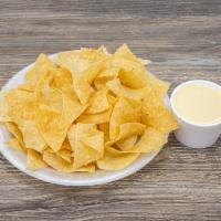 8 oz. Queso and Chips · Thinly sliced crispy potato. 