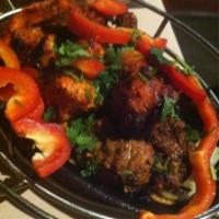 Mixed Tandoori Platter · Tandoori chicken, chicken tikka, seekh kabob and beef boti kabob.