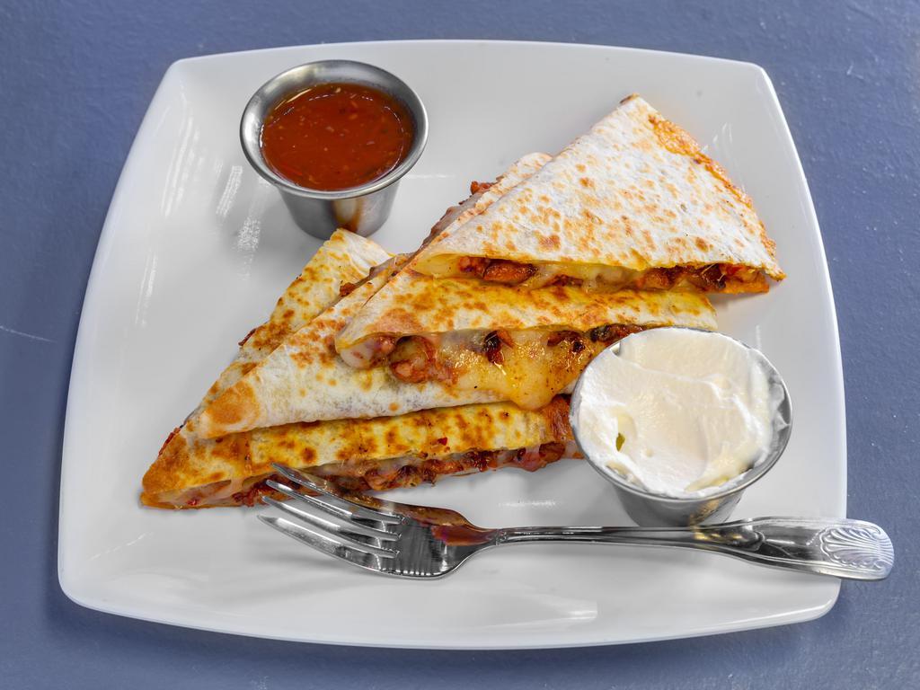 Quesadilla · Comes on flour with cheese, sour cream and homemade salsa. Your choice of protein.