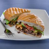 Torta · Comes on bolillo bread with mayonnaise, beans, cheese, onions, cilantro, pickled jalapeno, t...