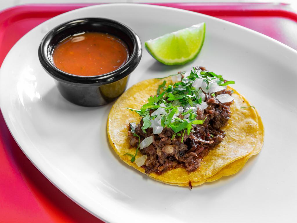 Barbacoa Taco · 1 piece. Served on a corn tortilla with cilantro onions and homemade salsa.