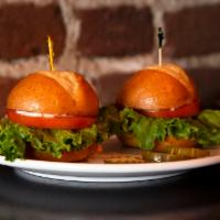 Stout's Sliders · Certified Angus beef mini burgers, cheddar, cheese, tomato, lettuce, & mayo.