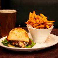 Tri Tip Sandwich · Tender slices of medium rare tri-tip marinated in house whiskey BBQ sauce, pepper jack chees...