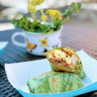 Breakfast Burrito · Inside a Spinach, Sundried tomato or Flour wrap filled with Country potatoes (Golden potatoe...