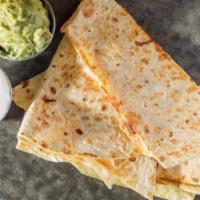 Quesadilla Sonora · Traditional Northern Mexican quesadilla with Sonora tortilla and melted Mexican sourced Oaxa...