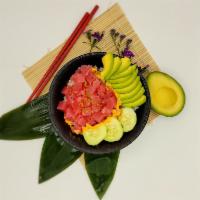 Spicy Tuna Poke Bowl · Sushi rice, tuna, avocado, cucumber, corn, spicy mayonnaise, and unagi sauce.