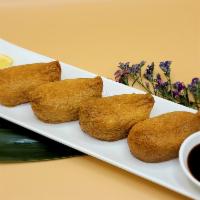 4 Pieces Inari Sushi  · Fried tofu with sushi rice. Include natural ginger and soy sauce.
