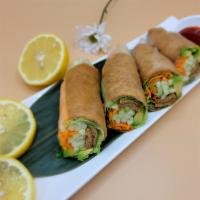 Tofu Spring Roll · Rice paper, fried tofu, avocado, cucumber, carrot, and lettuce.